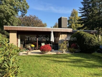  Charmanter Flachdachbungalow mit 2 Ferienwohnungen – Traumhafte Gartenanlage nahe dem Timmeler Meer
