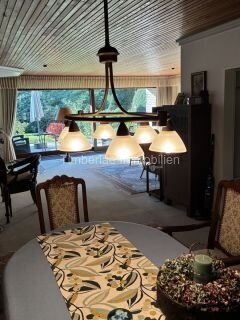  Charmanter Flachdachbungalow mit 2 Ferienwohnungen – Traumhafte Gartenanlage nahe dem Timmeler Meer